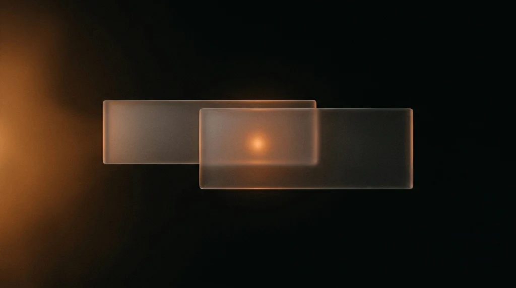 Two overlapping frosted glass slabs in a dark void, with a warm orange light glowing through the point where they cross.