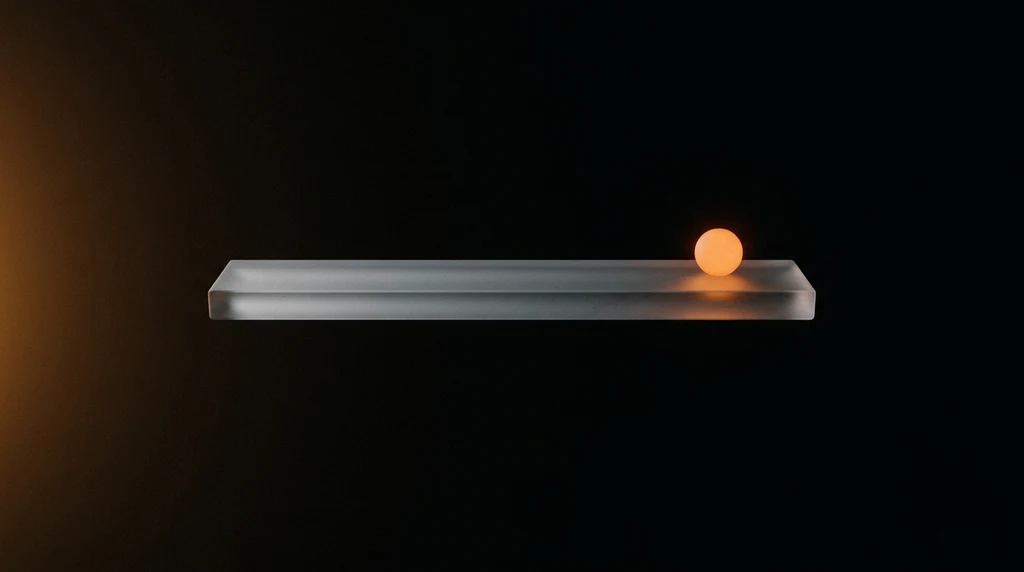 A long horizontal bar of frosted glass floating in near-black space, with a single warm orange glowing sphere resting near its right end.